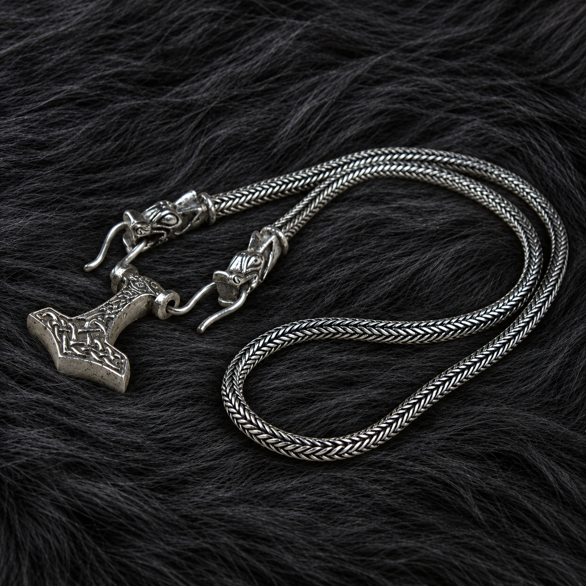 Complete Valhallas Silver Thor's hammer necklace with Viking-knit chain in sterling silver on dark fur