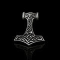 Valhallas Silver Thor's hammer pendant in sterling silver with knotwork on a reflective black background