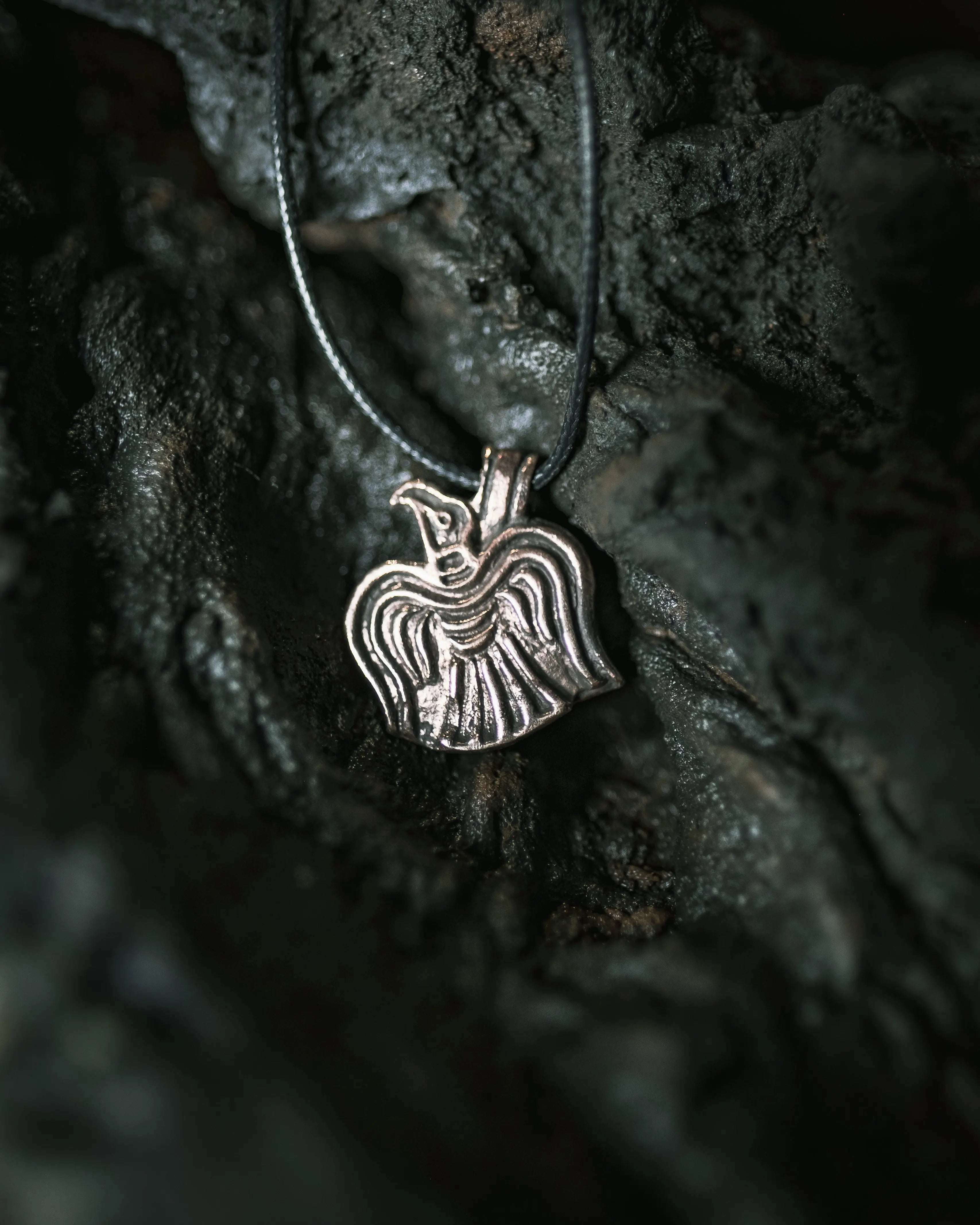Raven pendant in bronze