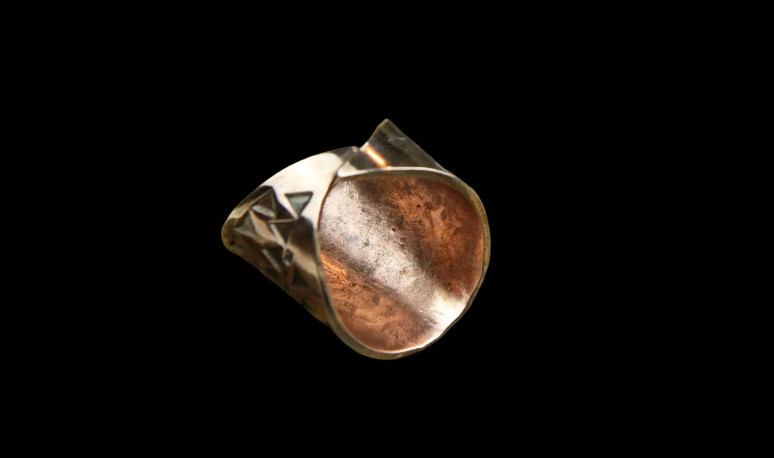 The inner of a beautiful Bronze Hand Stamped Ring made in high copper alloy.