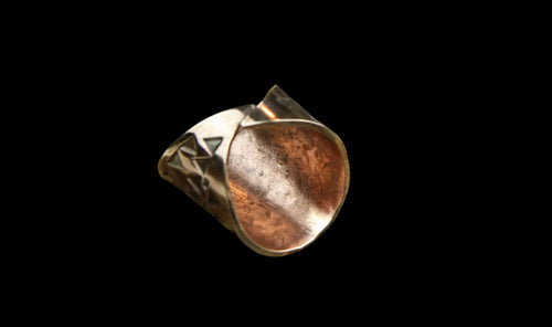 The inner of a beautiful Bronze Hand Stamped Ring made in high copper alloy.